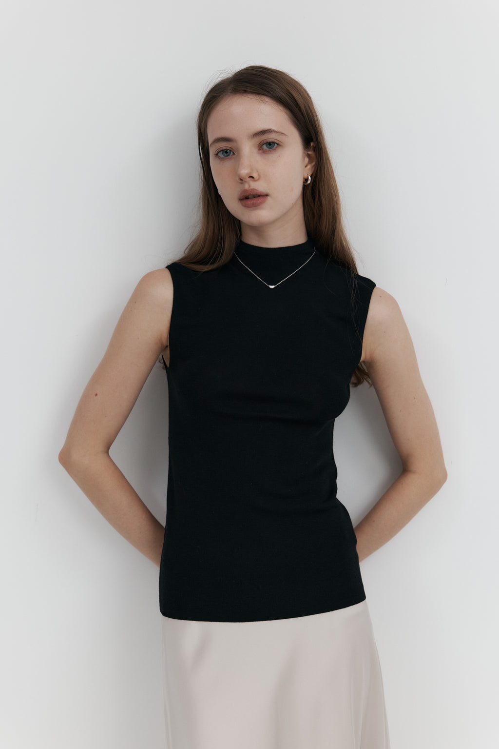 100% Merino Wool Mock Neck Sleeveless Knit